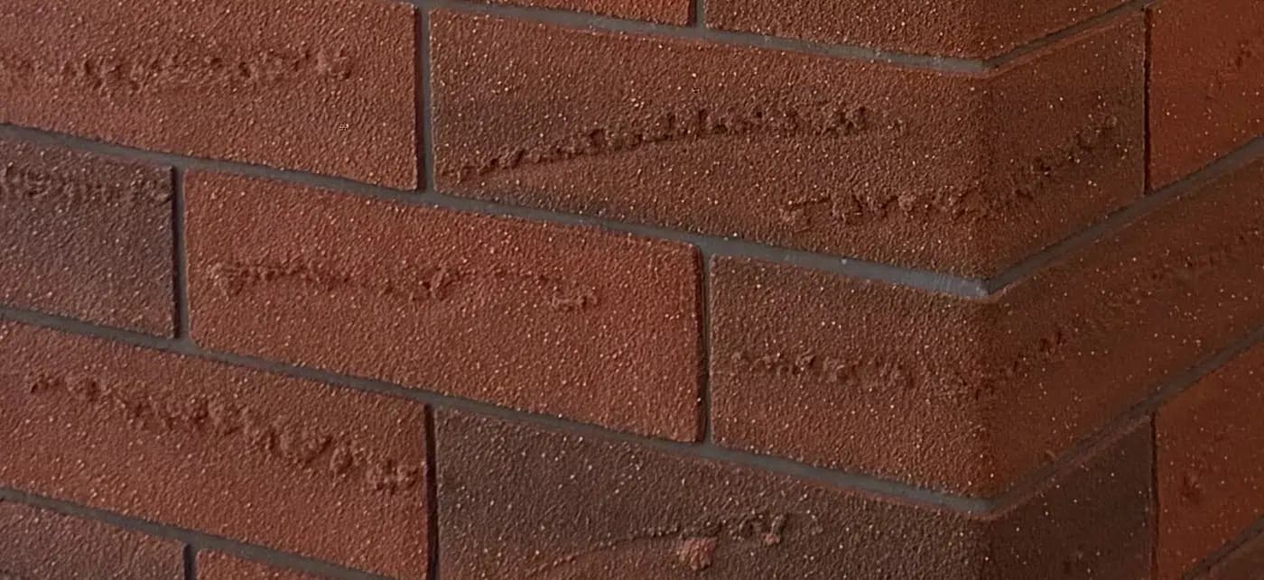 Close-up of handmade European brick with groutless shadow joints
